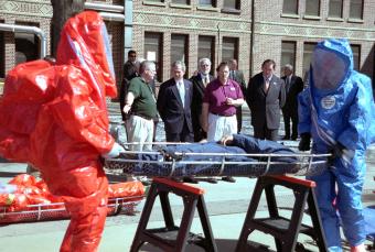 Emergency response workers simulated a chlorine gas emergency for President Bush on the Georgia Tech campus, March 27, 2002. Mr. Bush saw demonstrations of three GTRI technologies designed to help emergency workers.