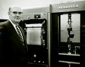 Researcher James L. Taylor and an Instron testing device, which measured...