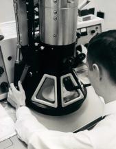 Researcher Jim Hubbard with the EM200 Electron Microscope